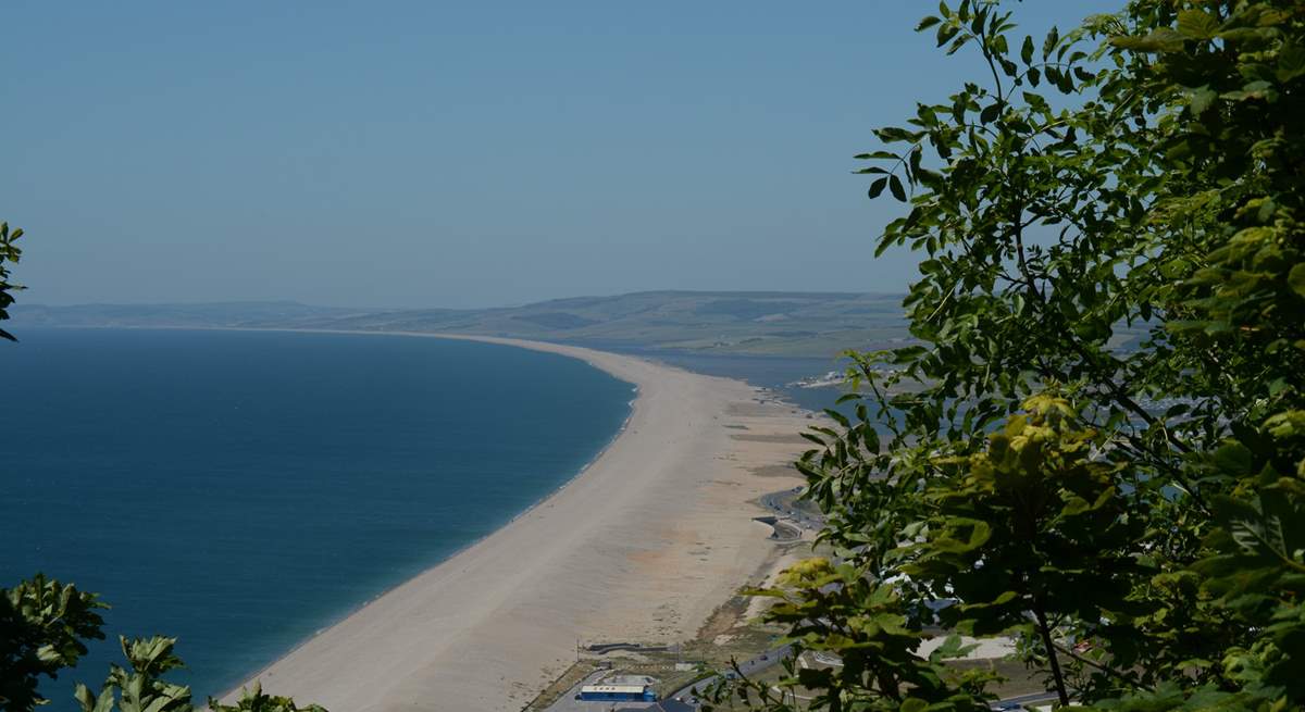 Chesil beach, taken from the Isle of Portland looking back along the Jurassic Coast towards Lyme Regis in the far distance.