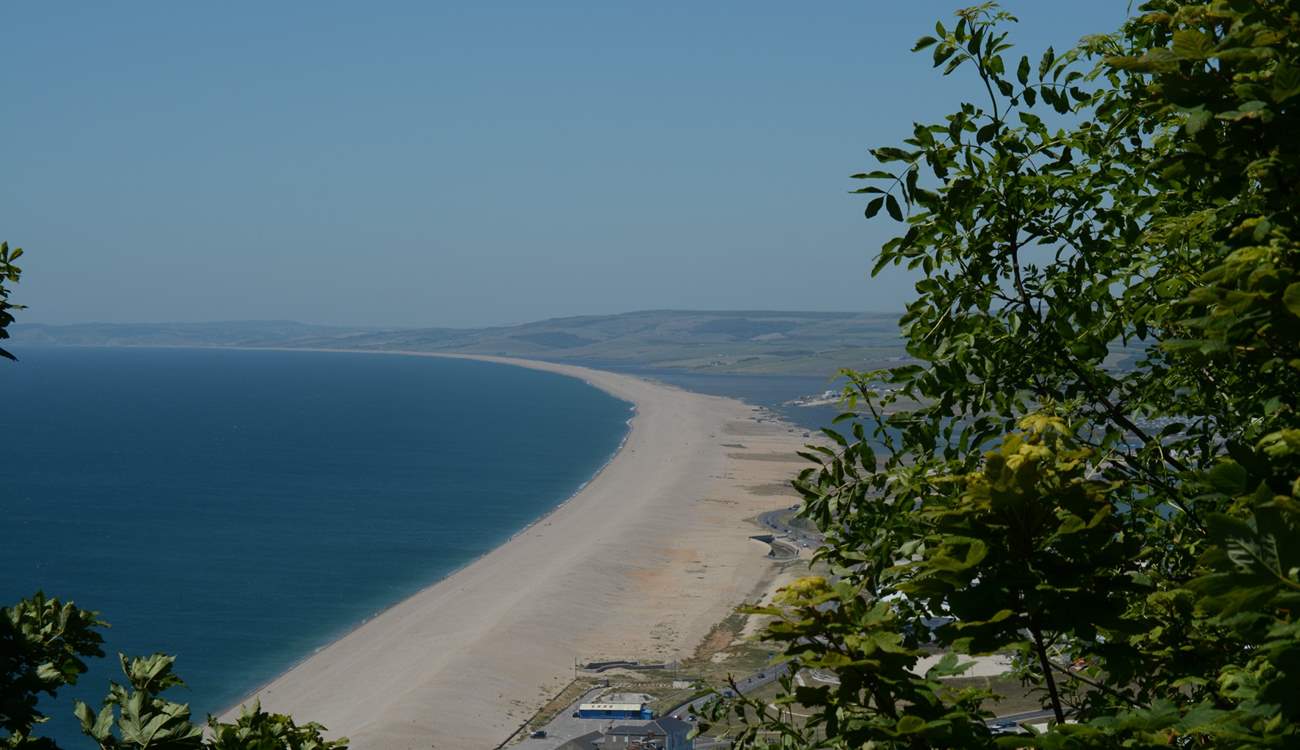 Chesil beach, taken from the Isle of Portland looking back along the Jurassic Coast towards Lyme Regis in the far distance.