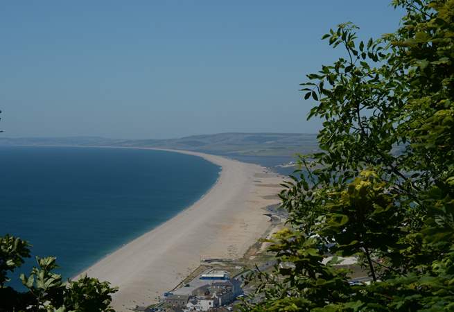 Chesil beach, taken from the Isle of Portland looking back along the Jurassic Coast towards Lyme Regis in the far distance.