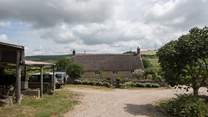 Looking down through the farmyard, the owners' house is at the bottom and the cottages to the right of the photo.