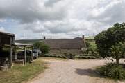 Looking down through the farmyard, the owners' house is at the bottom and the cottages to the right of the photo.
