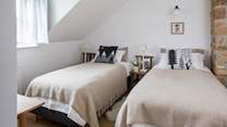 Bedroom 2 has a 'zip and link' (super-king or twin) bed. Please beware of the sloping ceiling.