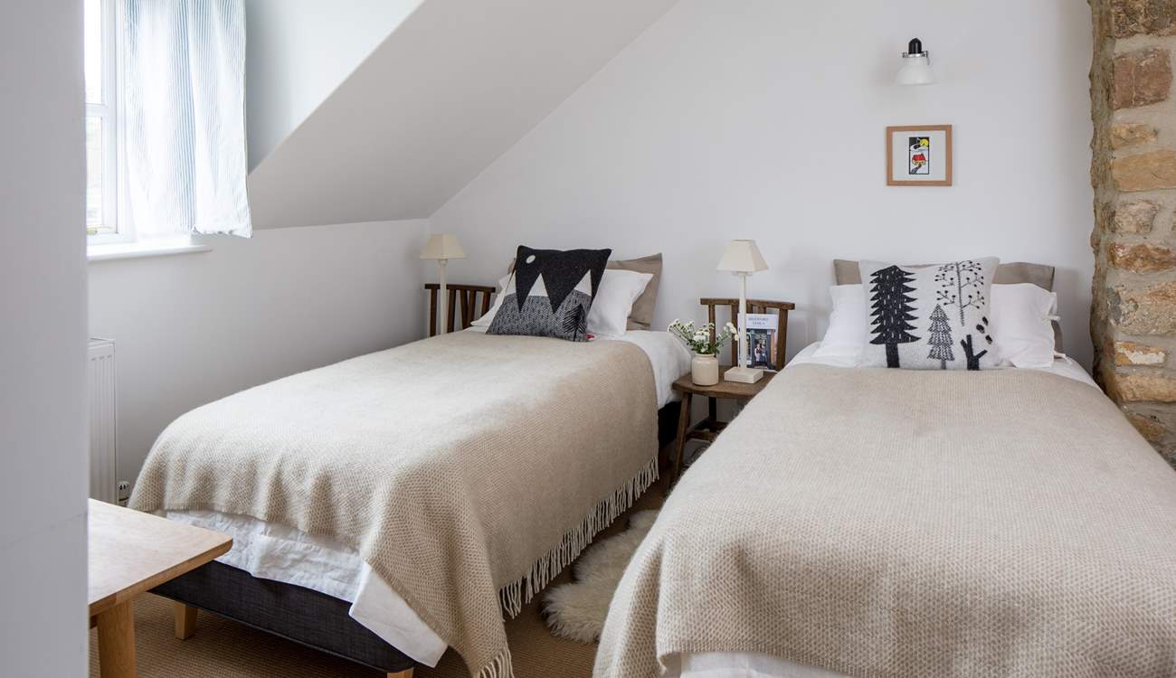 Bedroom 2 has a 'zip and link' (super-king or twin) bed. Please beware of the sloping ceiling.