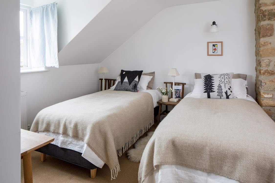 Bedroom 2 has a 'zip and link' (super-king or twin) bed. Please beware of the sloping ceiling.