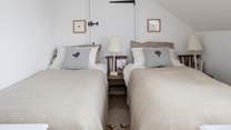 Bedroom 3 has a 'zip and link' (super-king or twin) bed, shown here as two, 3 ft beds. Please beware of the sloping ceiling.