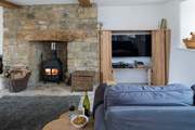With a cosy wood-burner and Smart TV for chilly evenings this open plan space is ideal for all the family.
