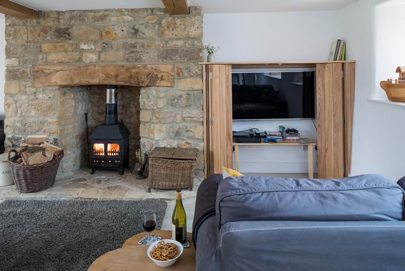 With a cosy wood-burner and Smart TV for chilly evenings this open plan space is ideal for all the family.