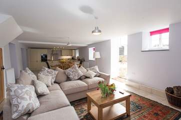 The front door leads from the living area to the terrace.