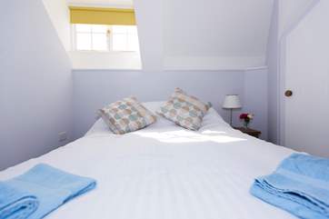The double bed in the family bedroom.
