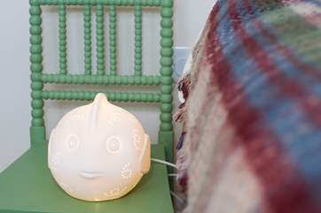 Children will love the ceramic fish lamp.