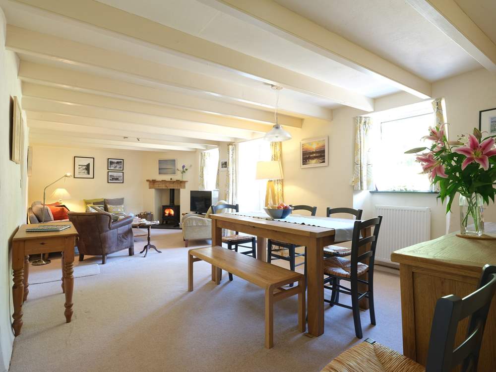 The spacious sitting/dining-room.