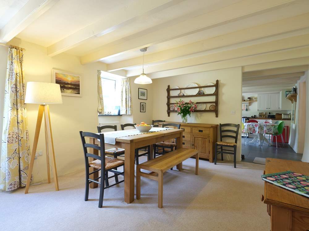 The dining area is open through to the kitchen.