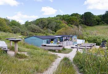 The Hidden Hut overlooks Porthcurnick beach.