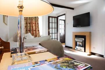 Curl up in front of the fire and simply relax.