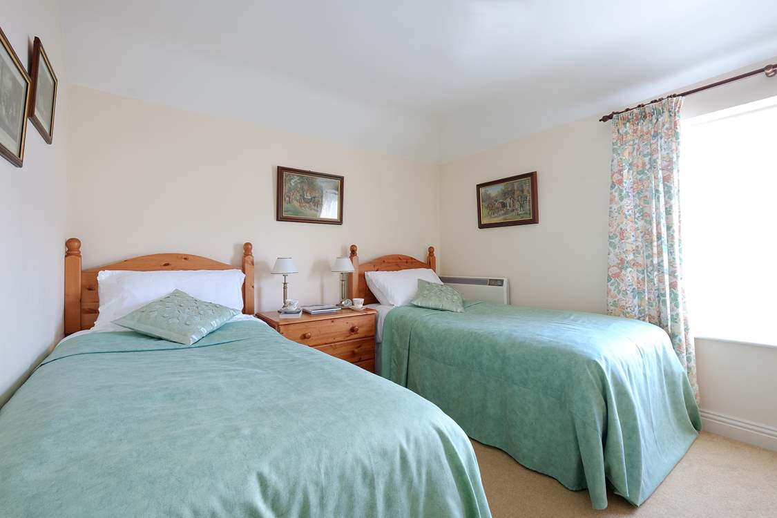 Bedroom 2 has twin beds, ideal for either children or adults.
