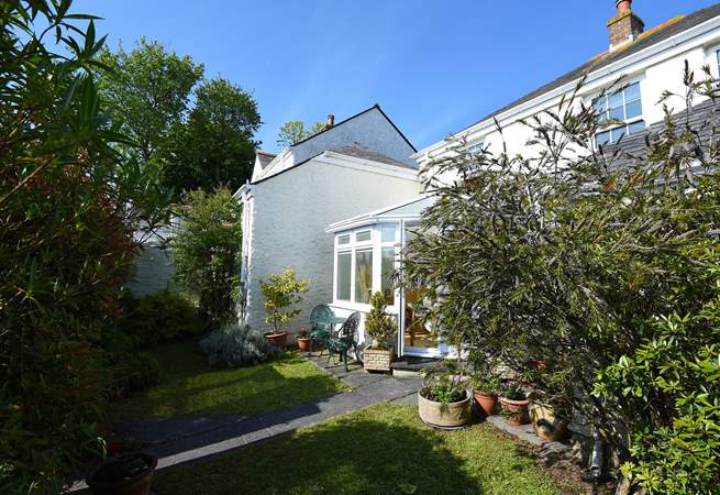 The secluded rear garden is delightful.