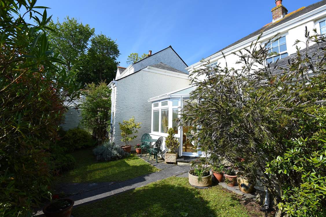 The secluded rear garden is delightful.