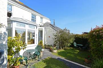 Sit in the rear garden and enjoy the sunshine.