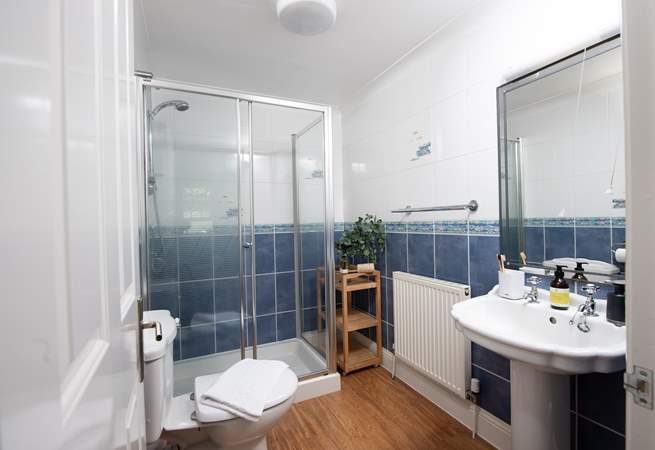Take a refreshing shower in the en suite shower room to bedroom 2.