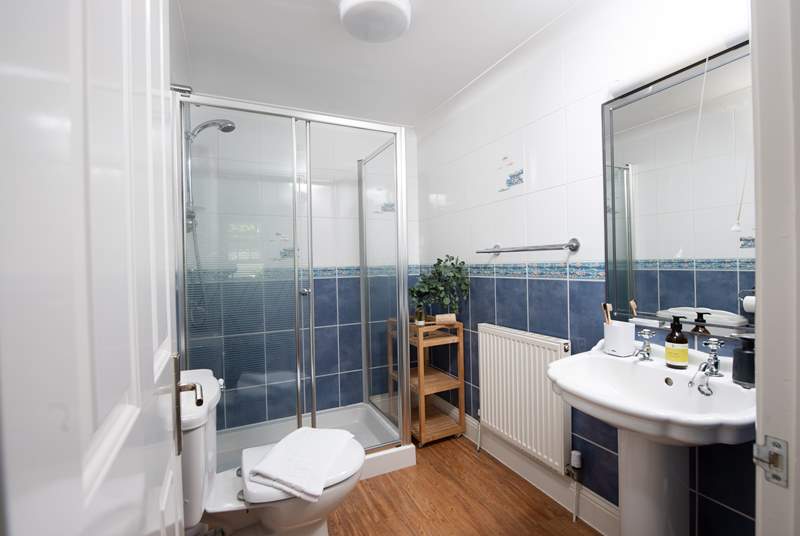 Take a refreshing shower in the en suite shower room to bedroom 2.