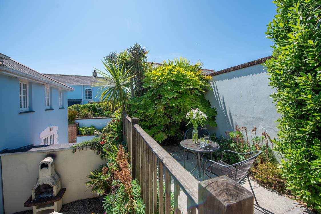 This secluded spot in the garden is ideal for morning coffee or perhaps an evening aperitif.