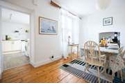 The well-equipped kitchen is next door to the dining-room.