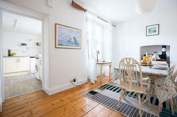 The well-equipped kitchen is next door to the dining-room.