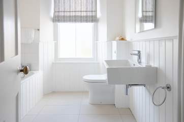 The super bathroom is on the first floor with a bath and shower cubicle.