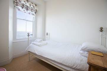 There are two single bedrooms, one on the first floor and one on the second floor.