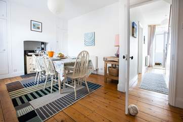 The dining room leads into the kitchen.