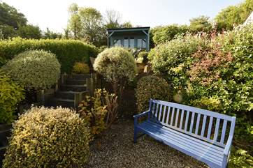 There are lots of places to sit in the garden.