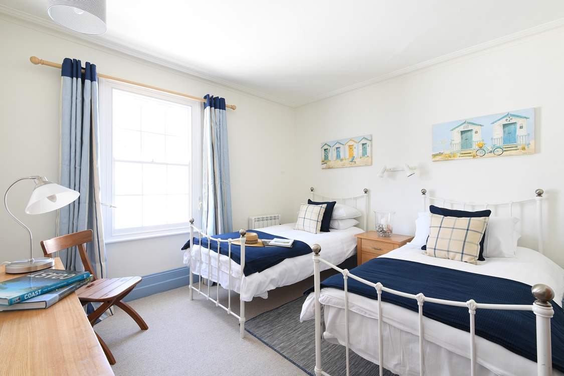 Pretty bedroom 1 has twin beds.