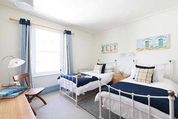 Pretty bedroom 1 has twin beds.