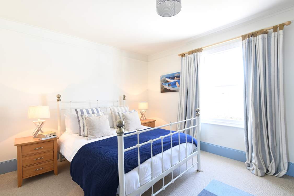 Bedroom 3 has a comfy king-size bed.