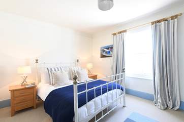 Bedroom 3 has a comfy king-size bed.