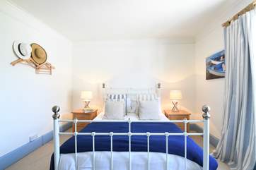 The pretty double bedroom with king-size bed.