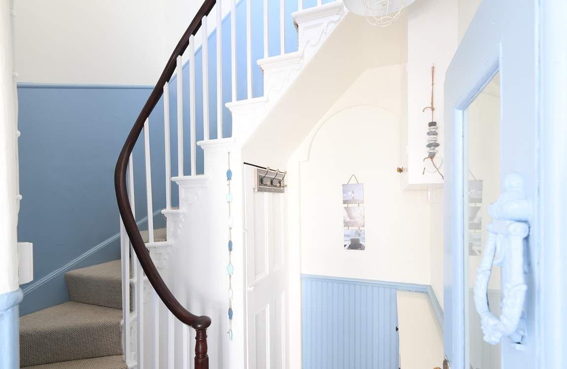 The turning stairs leading up to the living area.