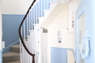 The turning stairs leading up to the living area.