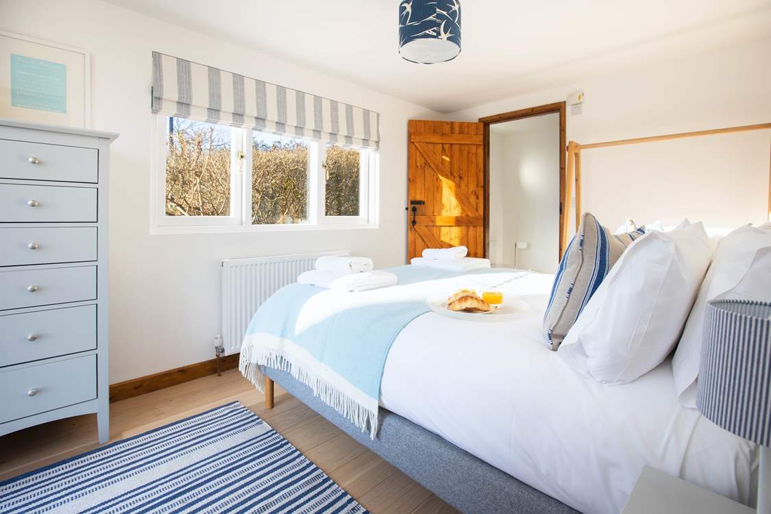 Bedroom 1 has a double bed and en suite shower-room.