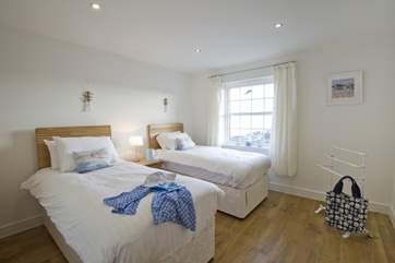 Bedroom 2 has a sea view and 'zip and link' beds that can be a twin or 6' double.