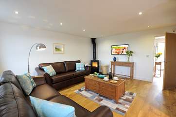 The sitting-room with cosy woodburner.