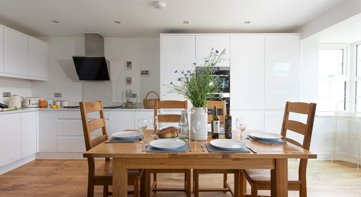 The stylish kitchen and dining table.