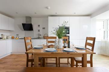 The stylish kitchen and dining table.