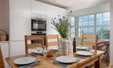 Enjoy sea views from the dining table.  - Thumbnail Image