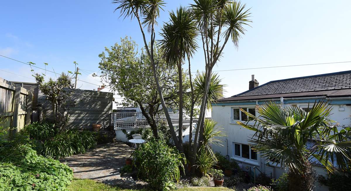 The pretty rear garden and terrace.