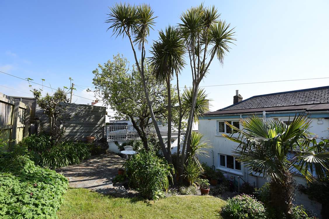 The pretty rear garden and terrace.