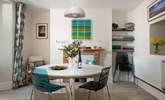 Gather everyone around the table in the dining-room. - Thumbnail Image