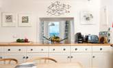 Catch a glimpse of the view from the kitchen.  - Thumbnail Image