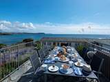 Enjoy breakfast on the terrace.