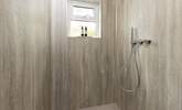 The walk-in shower, ideal for washing sandy toes. - Thumbnail Image